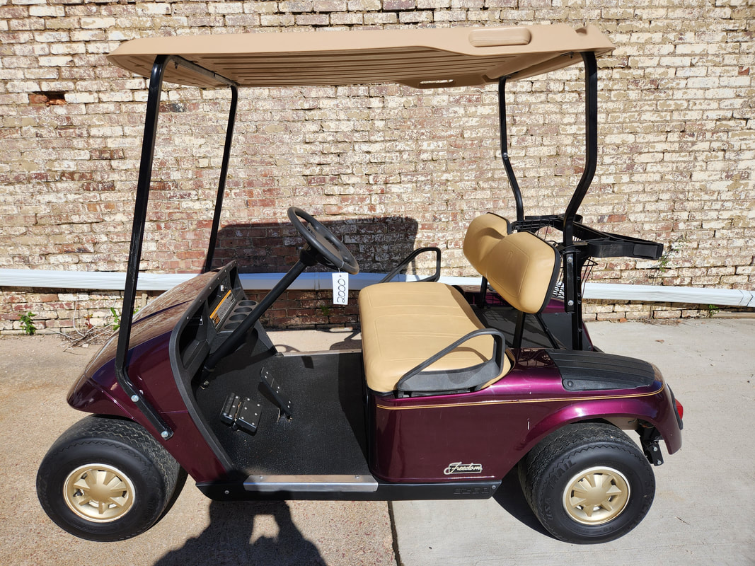 2000 E-Z-GO TXT PDS, Electric 48-Volt (6-8V Batteries), Burgundy, Tan Seats & Top, Freedom (Includes Head-Tail-Brake Lights, Horn, State of Charge Meter), Gold Pinstripe, Gold Hubcaps, MR. Golf Car Inc., Springfield, South Dakota