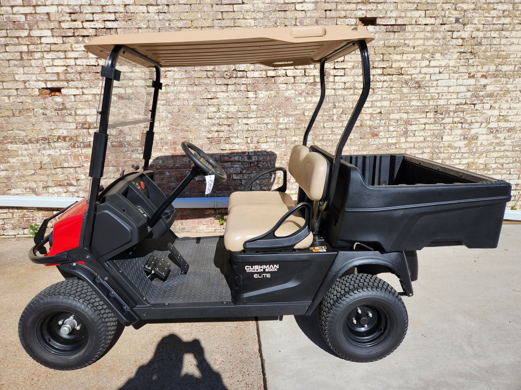 2022 Cushman Hauler 800X Elite 2.2, Samsung Lithium Battery, Flame Red, Tan Seats & Top, Head/Tail/Brake Lights, Horn, State of Charge Meter & Digital Speedometer, Limited Slip Differential w/ Scuff Guard, Manual Dump Box, Brush Guard, Clear Folding Windshield, 2